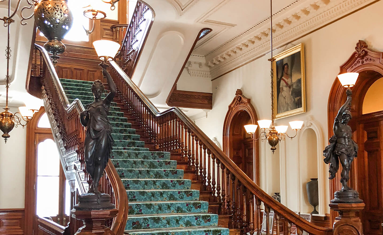 Hawaiian koa wood staircase in The Grand Hall at Iolani Palace