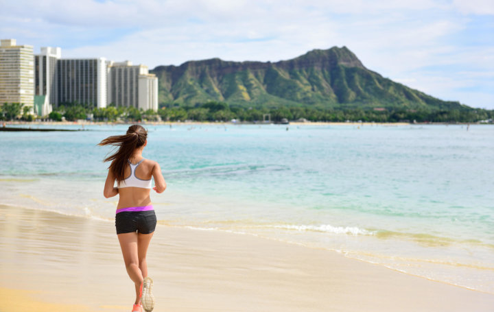 Woman jogging on Waikiki Beach