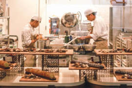 Bakery staff prepare a variety of artisan delicacies