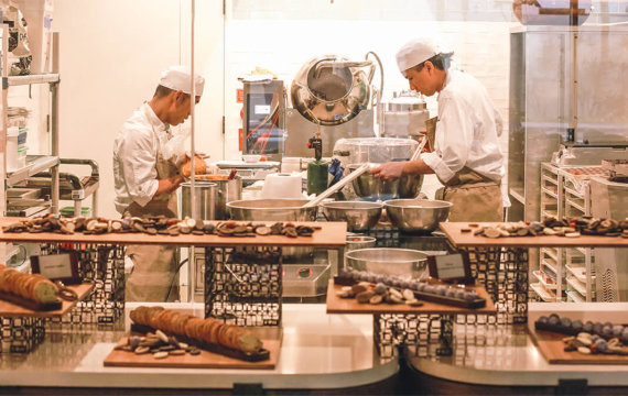 Bakery staff prepare a variety of artisan delicacies
